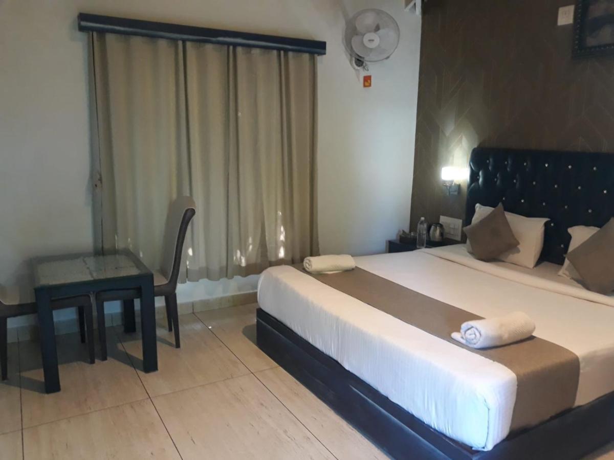Misty Rain Estate Hotel Madikeri Bagian luar foto
